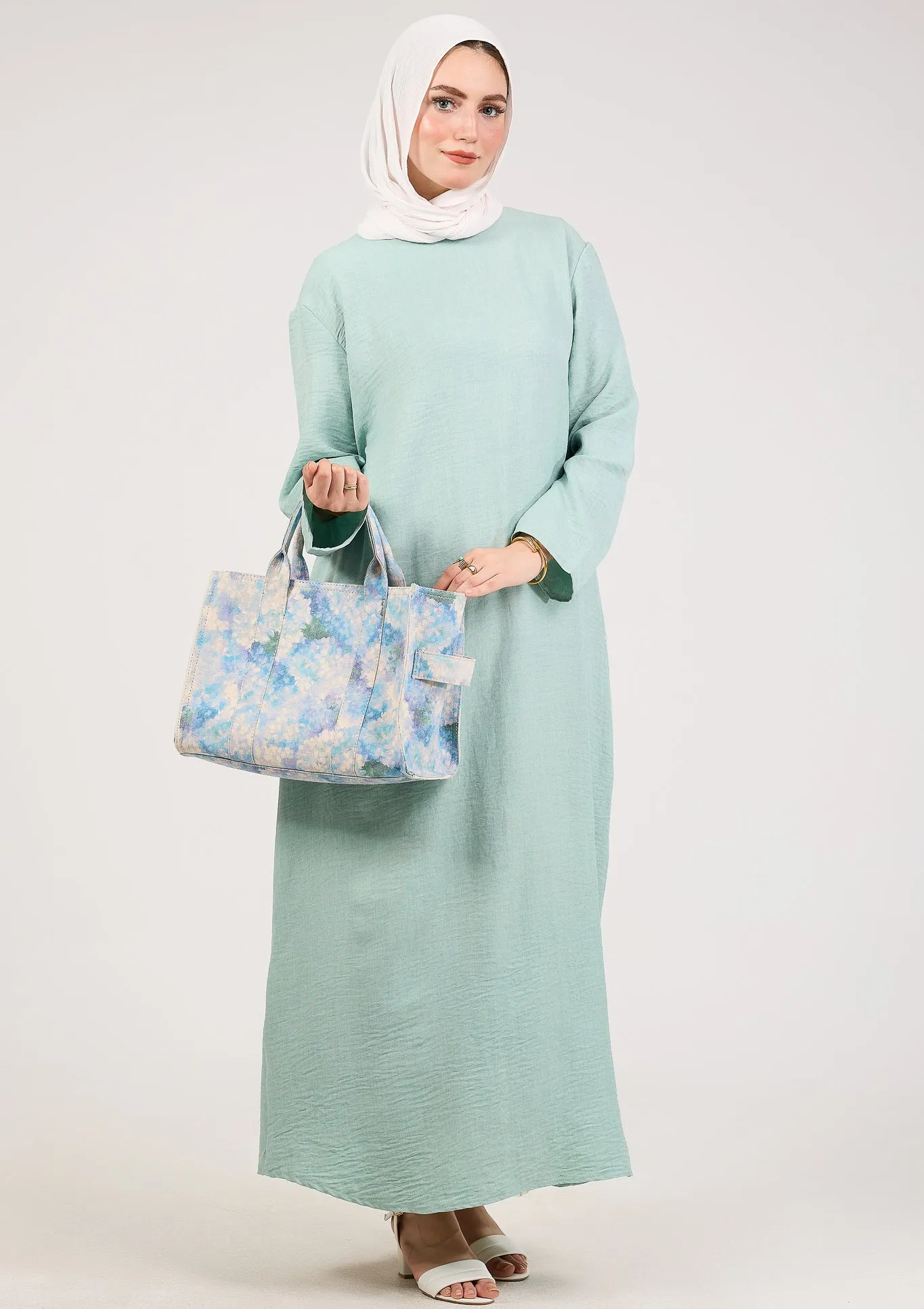 Light Green Kira loose slip dress with pockets in maxi length and with long sleeve