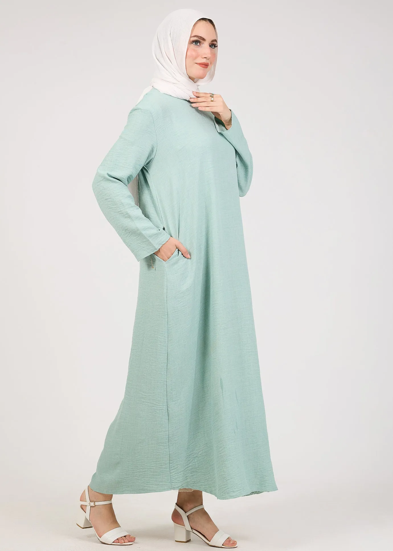 Light Green Kira loose slip dress with pockets in maxi length and with long sleeve