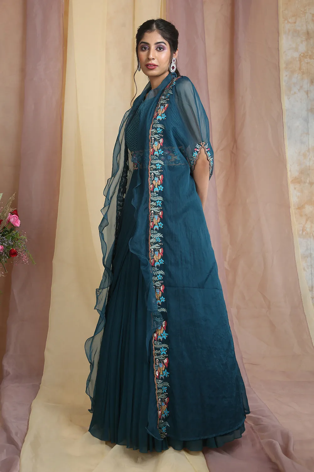 Peacock Blue Drape Gown With Cape And Belt